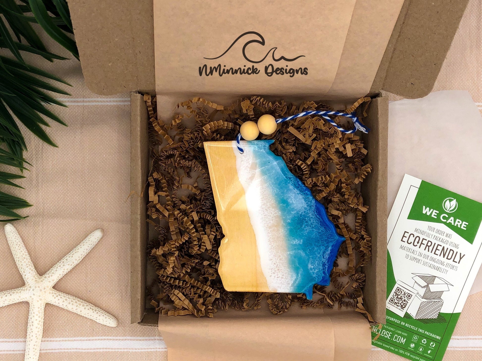 Georgia state beach ornament packaged in ecofriendly plastic free materials with recyclable box, tissue paper and paper shred.