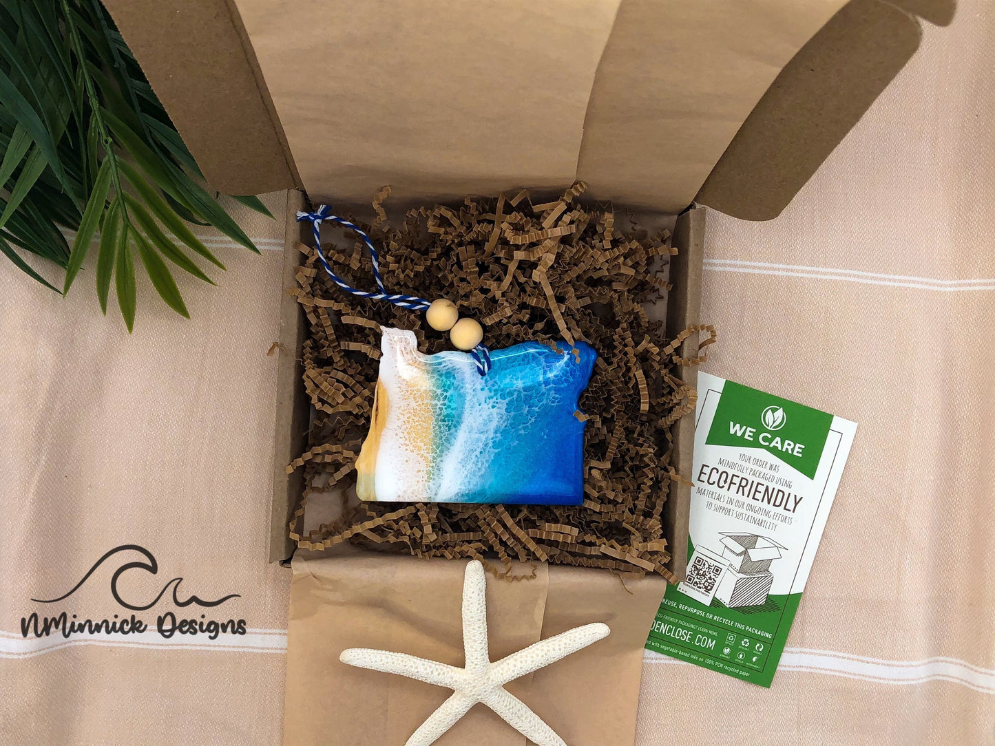 Oregon State Beach Ornament packaged in ecofriendly plastic free materials with recyclable box, tissue paper and paper shred.