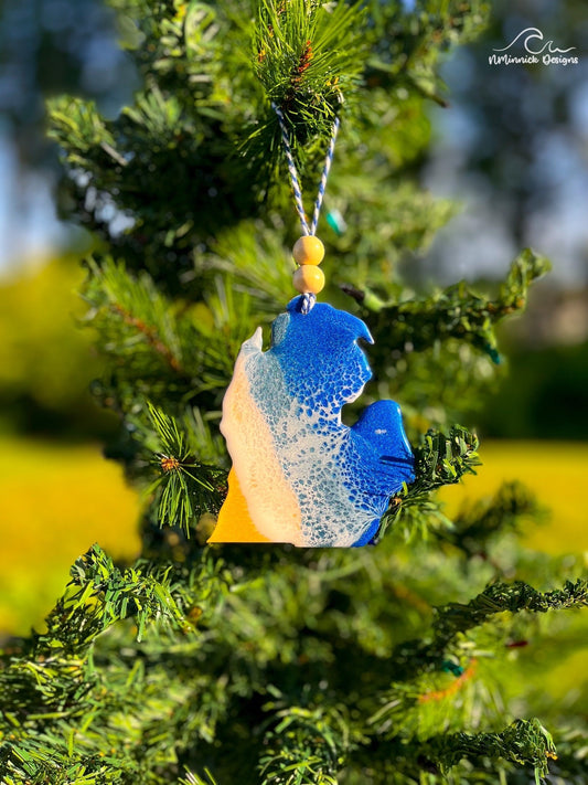 Michigan shaped laser cut wood ornament with dark blue and grey blue ocean waves inspired by the great lakes