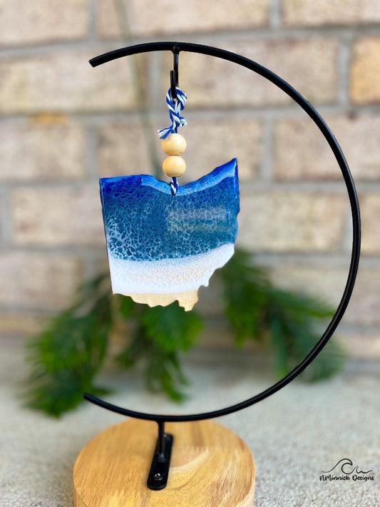 Ohio shaped wood ornament with dark blue and grey blue resin waves inspired by lake erie