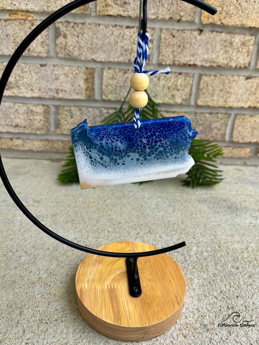 Pennsylvania shaped wood ornament with dark blue and grey blue resin waves inspired by lake erie