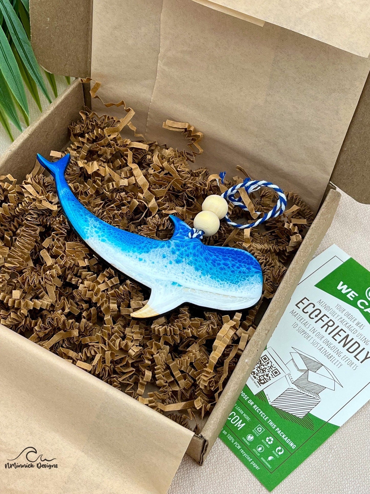 whale shark shaped wood and resin ornament adorned with ocean resin wave art. Packaged in ecofriendly plastic free materials