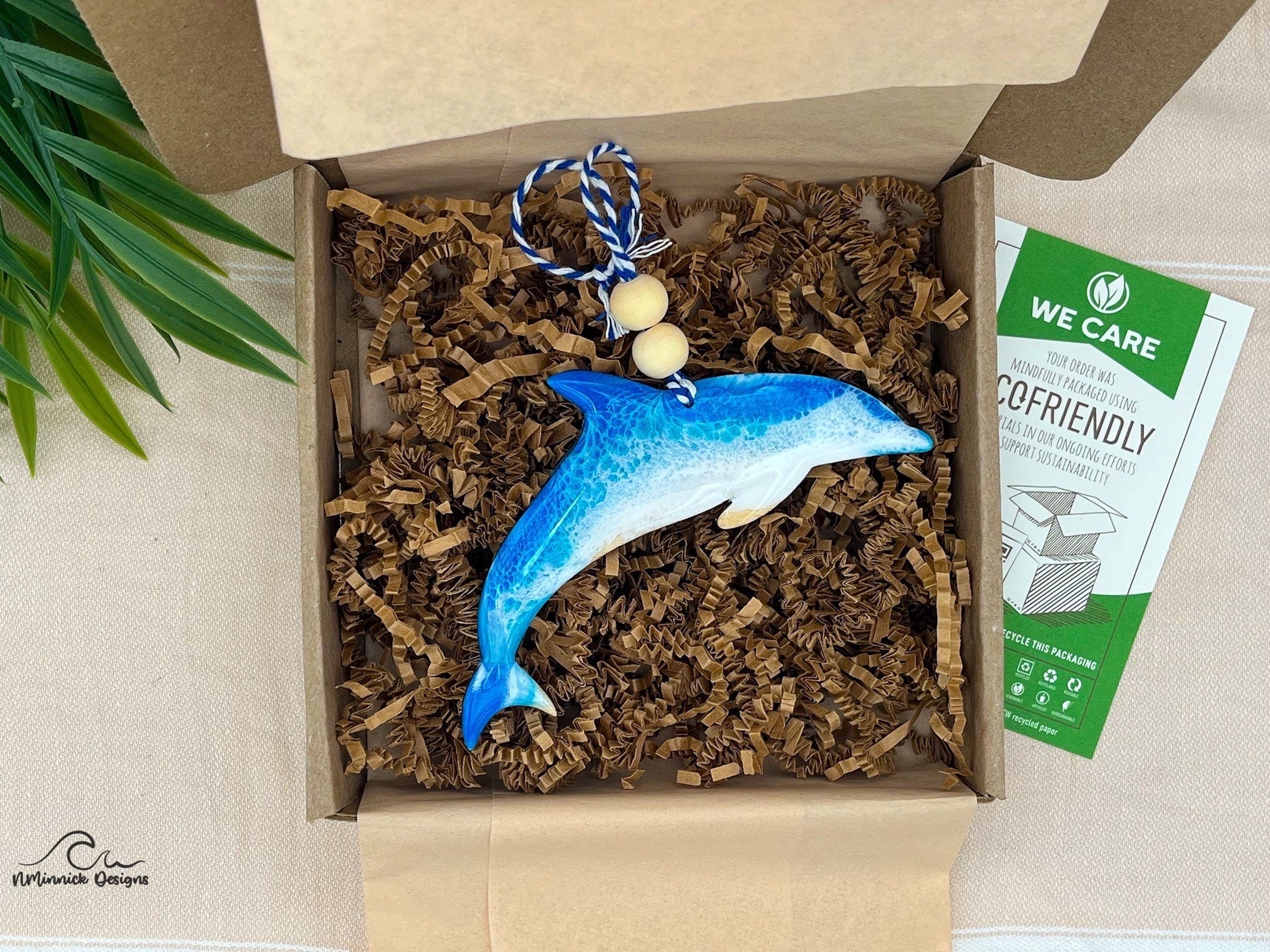 Dolphin ocean resin art ornament packaged in ecofriendly plastic free materials