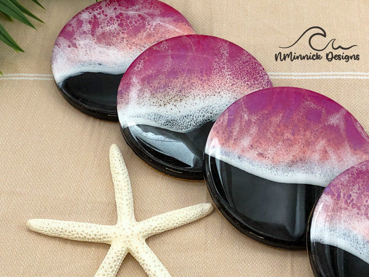 Pink Ocean Resin Coasters, Set of 4, Black Sand Beach with Real Sand, Ocean Wave created with resin. Coasters are 4 inch rounds with cork backings.